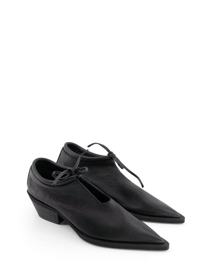 leather cowboy heels by Annk